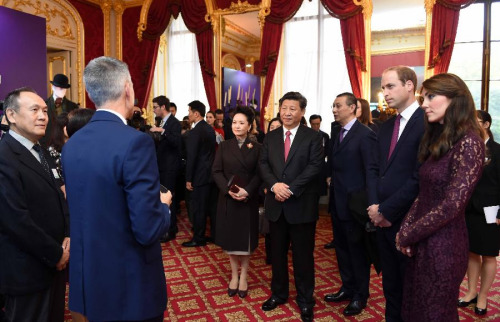 Chinese President Xi Jinping (4th R) and his wife Peng Liyuan are accompanied by British Prince William and his wife Kate, the Duchess of Cambridge, as they attend a creative industry event in London, Britain, Oct. 21, 2015. (Photo: Xinhua/Zhang Duo)