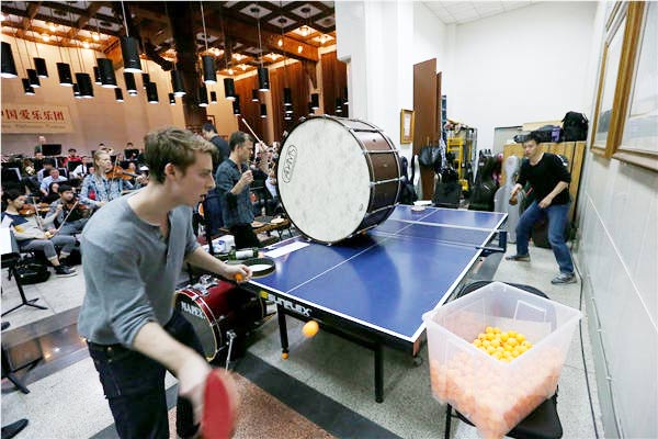 Table tennis players share the stage with musicians in the PingPong Concerto in Beijing. Jiang Dong / China Daily