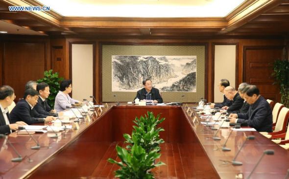 Yu Zhengsheng (back), chairman of the National Committee of the Chinese People's Political Consultative Conference (CPPCC) and also a member of the Standing Committee of the Political Bureau of the Communist Party of China (CPC) Central Committee, presides over a meeting of grasping the spirit highlighted at a key Communist Party of China (CPC) meeting and pooling wisdom for the nation's overall strategy for future development in Beijing, Oct. 30, 2015. (Photo: Xinhua/Yao Dawei)
