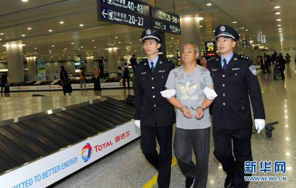 Zhao Ruheng, a Chinese corruption suspect who has been at large for three years, has been repatriated from Ghana to China, Nov. 1, 2015. (Photo/Xinhua)