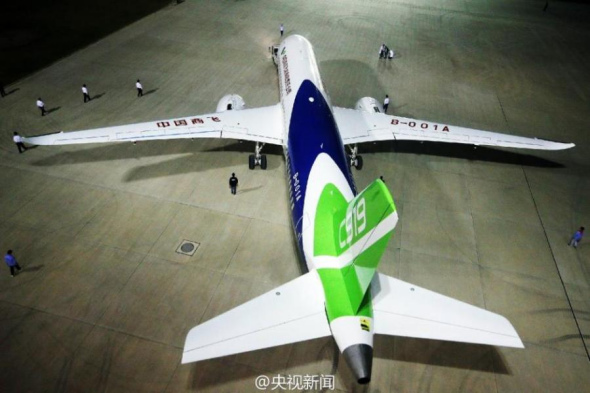 China's first large passenger jet C919 rolls off the production line in Shanghai municipality on November 2, 2015. The maiden test flight of the C919 is scheduled for 2016. So far, 450 orders from 18 domestic and foreign clients have been placed for the jetliner. (Photo /Weibo account of CCTV)