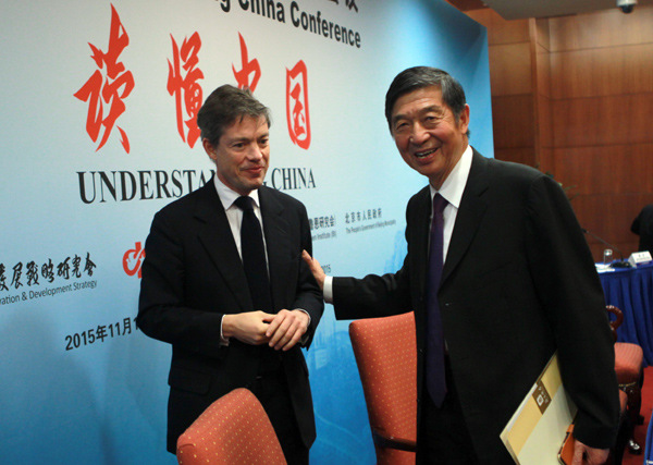 Wu Jianmin, China's former ambassador to France and adviser to the country's Foreign Policy Advisory Group, and Nicolas Berggruen, founder of the Berggruen Institute, meet with the media in Beijing on Tuesday. ZOU HONG/CHINA DAILY