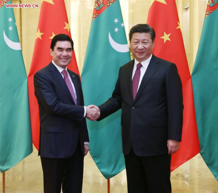 Chinese PresidentXi Jinping(R) shakes hands with Turkmenistan President Gurbanguly Berdymuhamedov in Beijing, capital of China, Nov. 12, 2015. (Photo: Xinhua/Liu Weibing)