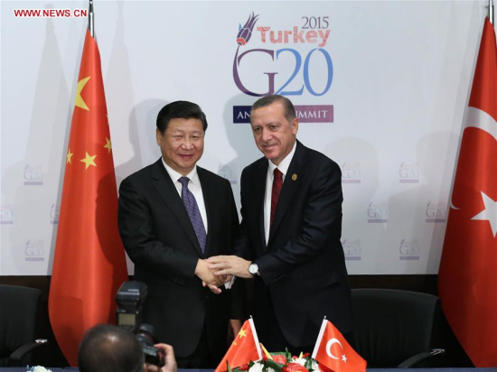 Chinese President Xi Jinping (L) shakes hands with his Turkish counterpart Recep Tayyip Erdogan in Antalya, Turkey, Nov. 14, 2015. (Xinhua/Pang Xinglei) 