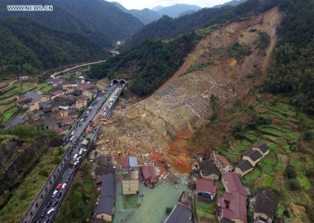 An aerial photo taken on Nov. 14, 2015 shows the site of a landslide in Lidong Village of Yaxi Township in Lishui, east China's Zhejiang Province. (Photo:Xinhua/Han Chuanhao)