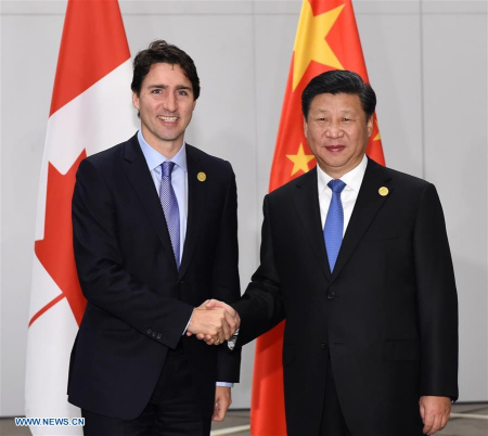 Chinese President Xi Jinping (R) meets with Canadian Prime Minister Justin Trudeau in Antalya, Turkey, Nov. 16, 2015. (Xinhua/Rao Aimin)