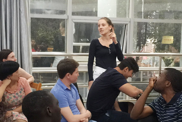 Foreign students meet their Chinese hosts at a gathering. (Photo provided to China Daily)