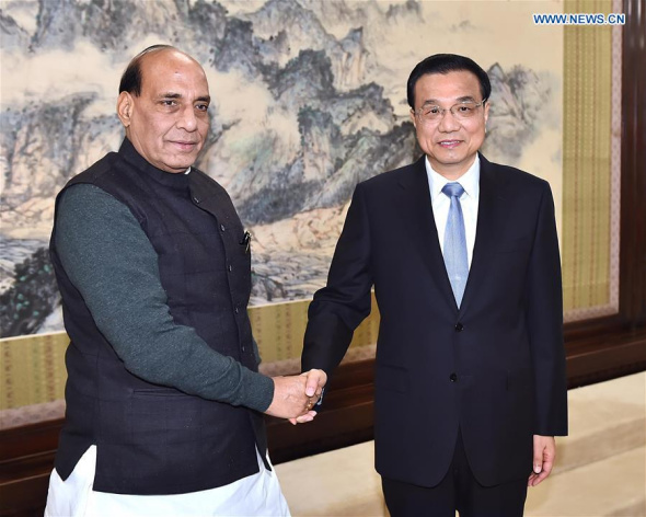 Chinese Premier Li Keqiang (R) meets with India's Minister of Home Affairs Rajnath Singh in Beijing, capital of China, Nov. 19, 2015. (Photo; Xinhua/Li Tao) 