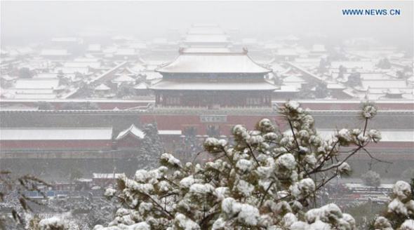 Photo taken on Nov. 22, 2015 shows the Palace Museum in Beijing, capital of China. Heavy snowfall hit a vast area of north China on Sunday, disrupting traffic in Beijing, Tianjin and Inner Mongolia Autonomous Region. (Photo: Xinhua/Xing Guangli)