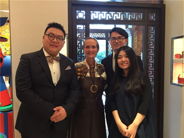 Pascale Mussard with three Chinese designers at the ongoing Shanghai Petit h exhibition. (Photo provided to China Daily)