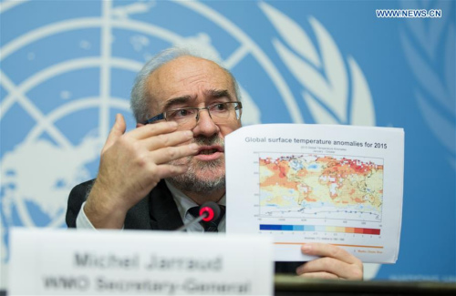 Michel Jarraud, Secretary-General of World Meteorological Organization (WMO) , shows a graphic at a press conference in Geneva, Switzerland, Nov. 25, 2015. (Xinhua/Xu Jinquan)