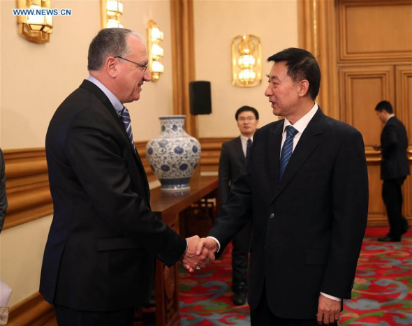 Chinese State Councilor Wang Yong (R) meets with the European Patent Office (EPO) President Benoit Battistelli in Beijing, capital of China, Nov. 26, 2015. (Photo: Xinhua/Liu Weibing)
