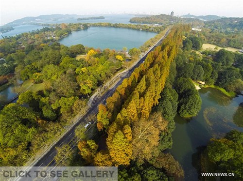 Aerial photo taken on Dec. 1, 2014 shows the scenic spot of West Lake in Hangzhou, capital of east China's Zhejiang Province. China will host the 2016 Group of Twenty (G20) summit in the eastern city of Hangzhou, best known for its scenic West Lake, on Sept. 4-5, Chinese President Xi Jinping announced in Antalya, Turkey, on Nov. 16, 2015. (Xinhua/Xu Yu)