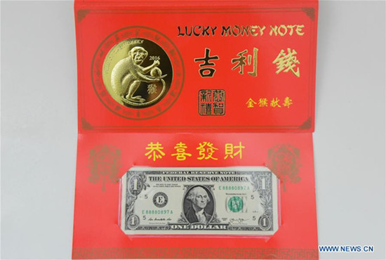 Photo taken on Nov. 17, 2015 shows appearance of Year of the Monkey 2016 Lucky Money during a press conference in Washington D.C., capital of the United States. (Photo/Xinhua)