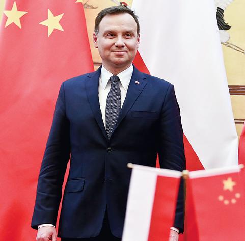 Polish President Andrzej Duda attends a signing ceremony for cooperation with China in the Great Hall of the People in Beijing on Wednesday. FENG YONGBIN / CHINA DAILY