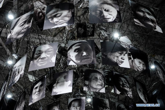 Portraits of victims are hung in the memorial for comfort women in Nanjing, east China's Jiangsu Province, Dec. 1, 2015.  (Xinhua/Li Xiang)