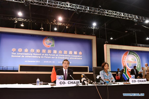 Chinese Foreign Minister Wang Yi (L) and South African Minister of International Relations and Cooperation Maite Nkoana-Mashabane attend a joint press conference after the closing of the Johannesburg summit of the Forum on China-Africa Cooperation in Johannesburg, South Africa, Dec. 5, 2015. Chinese Foreign Wang Yi said on Saturday the implementation of the China-Africa Industrial Cooperation Strategy has started in three countries in East Africa and has been expanded to South Africa and Egyptin North Africa on a pilot basis. (Photo: Xinhua/Sun Ruibo)