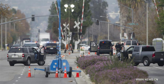 Photo taken on Dec. 4, 2015 shows the outside of the Inland Center where a deadly shooting happened two days ago, in San Bernardino, California. The FBI is investigating the deadly Southern California shooting carried out by a couple that killed at least 14 people and injured 23 others on Wednesday as an act of terrorism, an agency official said Friday. (Xinhua/Yang Lei)