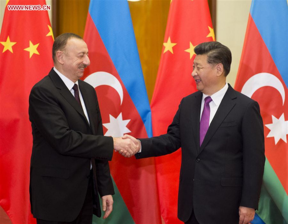 Chinese President Xi Jinping (R) holds a welcoming ceremony for Azerbaijan President Ilham Aliyev before their talks in Beijing, capital of China, Dec. 10, 2015. (Photo; Xinhua/Li Xueren) 