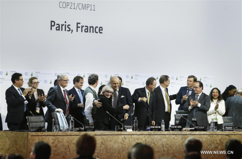 Photo taken on Dec. 12, 2015 shows the final conference at the COP21, in Le Bourget, Paris, Dec.12, 2015. The historic Paris agreement on climate change is finally adopted with no objection on Saturday by the 196 Parties of the United Nations Framework Convention on Climate Change (UNFCCC) during the 21st session of the Conference of the Parties (COP21) hosted by France. (Xinhua/Zhou Lei)