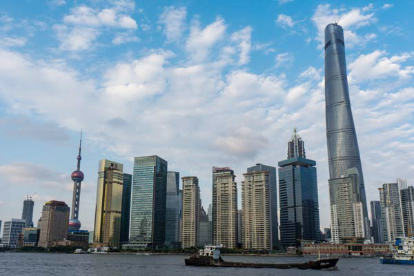 Shanghai Tower (the highest in the picture), a new landmark of Shanghai's financial hub Lujiazui, is nearly complete.(Photo provided to China Daily)