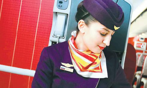 Bazhenova Evgenia, a Russian flight stewardess, 31, has been flying with Hainan Airlines for years. (CAI LINHAO / FOR CHINA DAILY)