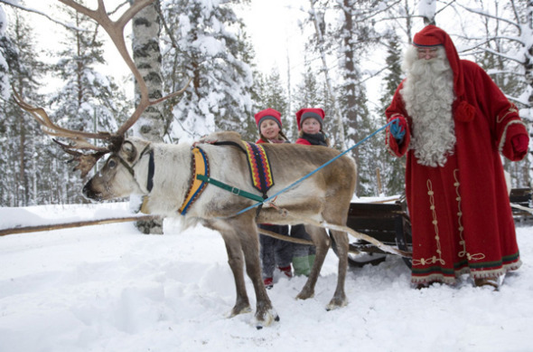 Asian tourists flock to the home of Santa Claus. (Photo/CNTV)