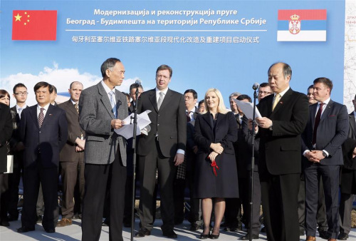 Wang Xiaotao, the deputy head of China's National Development and Reform Commission (Front-R), Chinese ambassador to Serbia Li Manchang (Front-L), Serbian Prime Minister Aleksandar Vucic (C) attend the ceremony of the opening of the construction works at the Belgrade-Budapest railway in Novi Sad, Serbia, Dec. 23, 2015. (Photo: Xinhua/Predrag Milosavljevic)