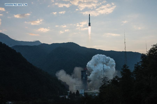 A Long March-3B carrier rocket carrying a new-generation Beidou satellite lifts off from the Xichang Satellite Launch Center in Xichang, southwest China's Sichuan Province, Sept. 30, 2015. China sent a new-generation satellite into orbit that will support its global navigation and positioning network at 7:13 a.m. Beijing Time Wednesday (2313 GMT Tuesday). It was the 20th satellite for the Beidou Navigation Satellite System (BDS).(Photo: Xinhua/Li Xiang)