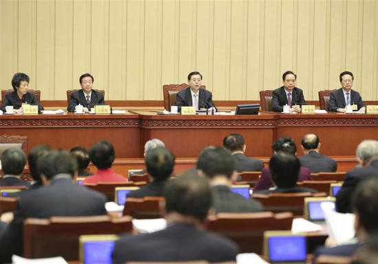 Zhang Dejiang (C), chairman of the Standing Committee of China's National People's Congress (NPC), presides over the closing meeting of the 18th bimonthly meeting of the National People's Congress (NPC) Standing Committee, in Beijing, capital of China, on Dec. 27, 2015. (Photo: Xinhua/Ding Lin)