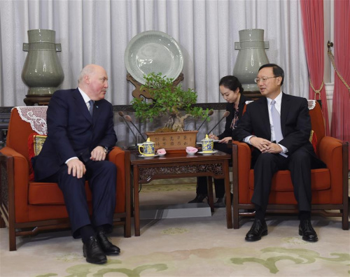 Chinese State Councilor Yang Jiechi (R) meets with outgoing Secretary-General of the Shanghai Cooperation Organization (SCO) Dmitry Mezentsev in Beijing, capital of China, Dec. 29, 2015. (Photo: Xinhua/Wang Ye)