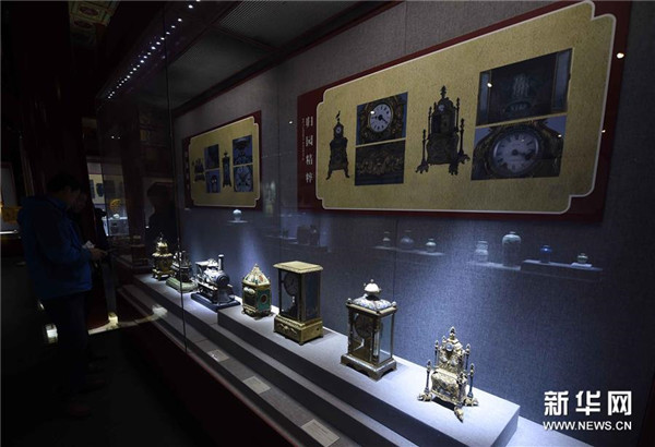 Cultural relics are on display at an exhibition at the Garden of Harmonious Virtue in Beijing's Summer Palace on Dec 28, 2015. (Photo/Xinhua)