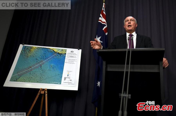 Australian Deputy Prime Minister Warren Truss introduces the highest possible area for the search of MH370 during a press conference at the Parliament House in Canberra, Australia, Dec. 3, 2015. Australian authorities have expressed renewed confidence that they will find the missing Malaysia Airlines flight MH370 within the current search zone. (Xinhua/Justin Qian)