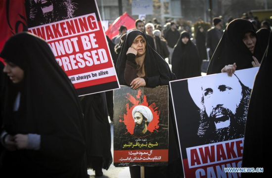 People take part in a demonstration against Saudi Arabia, in Tehran, Iran, Jan. 4, 2016. A demonstration was held on Monday in Tehran to protest against Saudi Arabia's execution of Baqer al-Nimr, a prominent Shia scholar who was known to be an open opponent to the Sunni ruling dynasty. (Photo: Xinhua/Ahmad Halabisaz)