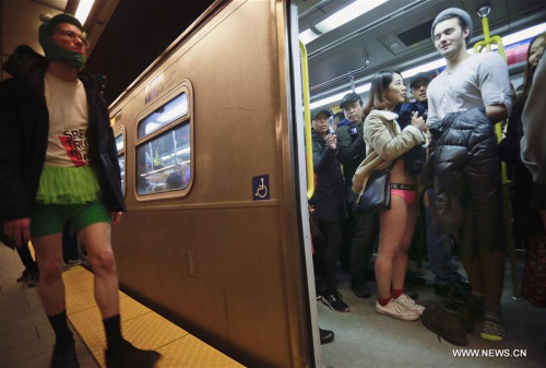 People take part in the No Pants Subway Ride event in Vancouver, Canada, Jan. 10, 2016. (Photo: Xinhua/Liang sen)