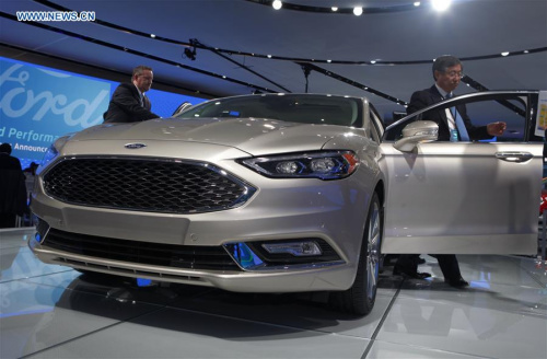 The 2017 Ford Fusion is on display at the North American International Auto Show in Detroit, the United States, on Jan. 11, 2016. (Photo: Xinhua/Li Bowen)