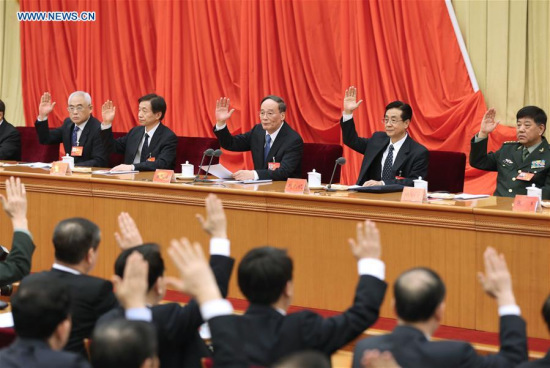 Wang Qishan (3rd R, rear), a member of the Standing Committee of the Political Bureau of the Communist Party of China (CPC) Central Committee and secretary of the CPC Central Commission for Discipline Inspection (CCDI), attends the 6th plenary session of the 18th CPC Central Commission for Discipline Inspection in Beijing, capital of China, from Jan. 12 to 14. (Photo: Xinhua/Ma Zhancheng)