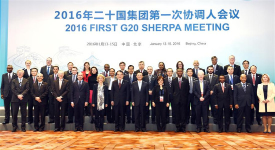 Chinese State Councilor Yang Jiechi (C, front) poses for a group photo with delegates attending the first G20 sherpa meeting during its opening ceremony in Beijing, capital of China, Jan. 14, 2016. (Photo: Xinhua/Zhang Ling)
