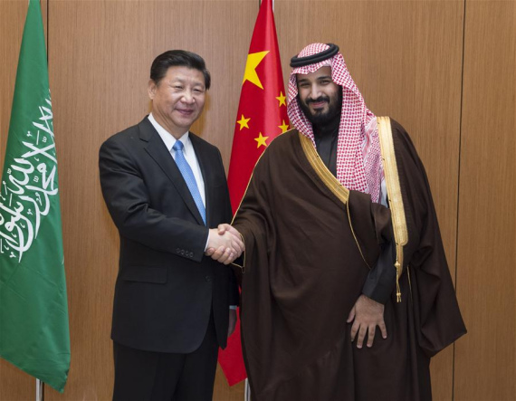 Chinese President Xi Jinping (L) meets with Saudi Deputy Crown Prince Mohammed bin Salman in Riyadh, Saudi Arabia, Jan. 19, 2016. Xi arrived here on Tuesday for a state visit to Saudi Arabia, the first stop of his three-nation tour of the Middle East. (Photo: Xinhua/Wang Ye)