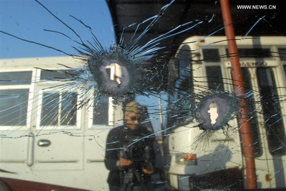 Bullet holes are seen at the Bacha Khan university in northwest Pakistan's Charsadda on Jan. 20, 2016. At least 22 people were killed and over 40 others injured when an unknown number of gunmen stormed the university in Charsadda district of Pakistan's northwest province of Khyber Pakhtunkhwa on Wednesday morning, local media reported. (Photo: Xinhua/Umar Qayyum) 