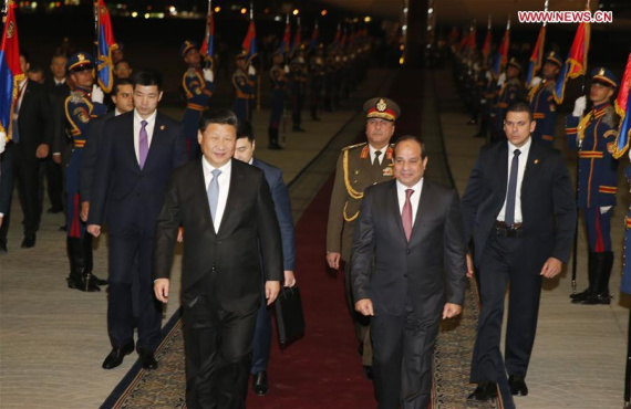 Egyptian President Abdel Fattah al-Sisi (R front) greets Chinese President Xi Jinping (L front) upon his arrival in Cairo, Egypt, January 20, 2016. Chinese President Xi Jinping arrived in Cairo Wednesday for a state visit to Egypt, the second leg of his three-nation Middle East tour. (Photo: Xinhua/Ju Peng)