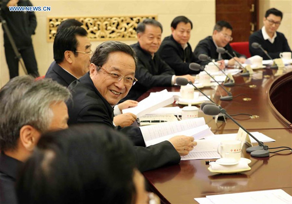 Yu Zhengsheng (3rd L), chairman of the National Committee of the Chinese People's Political Consultative Conference (CPPCC), presides over a bi-weekly consultation session of the CPPCC on establishing regulations for express industry, in Beijing, capital of China, Jan. 21, 2016. (Xinhua/Liu Weibing)