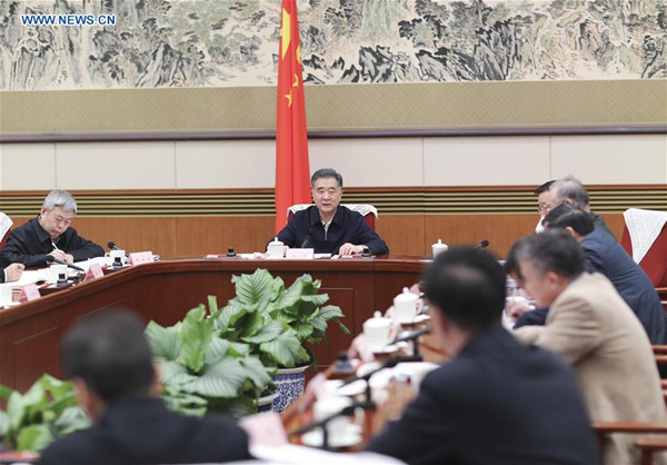Chinese Vice Premier Wang Yang (C back), who is also head of the Leading Group for Poverty Alleviation and Development under the State Council, attends the 9th plenary session of the leading group in Beijing, capital of China, Jan. 21, 2016. (Xinhua/Ding Lin)