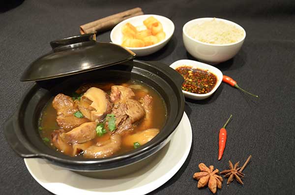 Klang style bah kut teh, a porkrib dish cooked in broth, is JW Marriott Beijing Central's signature dish.(Photo provided to China Daily)