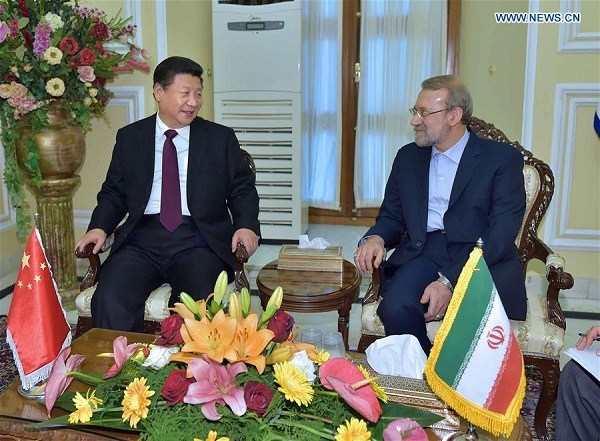 Chinese PresidentXi Jinping(L) meets withIranian Parliament Speaker Ali Larijani in Tehran, Iran, Jan. 23, 2016. (Xinhua/Li Tao)