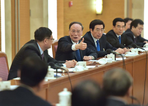 Wang Qishan (back, 2nd L) joins a panel discussion of deputies to the 12th National People's Congress (NPC) from Beijing, in Beijing, capital of China, March 5, 2015. (Photo: Xinhua/Li Tao)