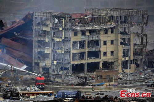 Photo taken on Aug. 15, 2015 shows a scene of the warehouse explosion site in Tianjin, north China. (CNS photo/Tong Yu)