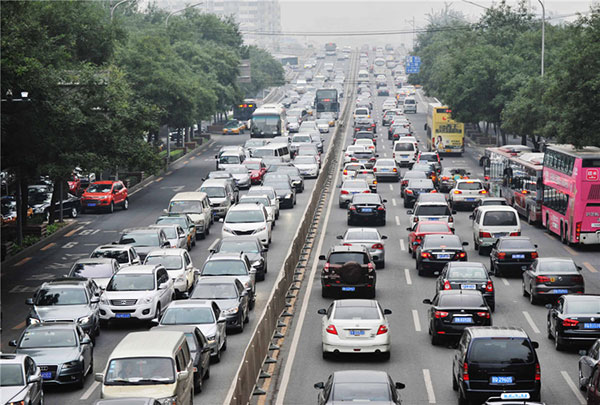 Traffic grinds to a standstill during the peak rush hour on Monday morning, Sept 22, 2014 near Liujiayao Bridge, Third Ring Road South in Beijing. (Photo/Xinhua)