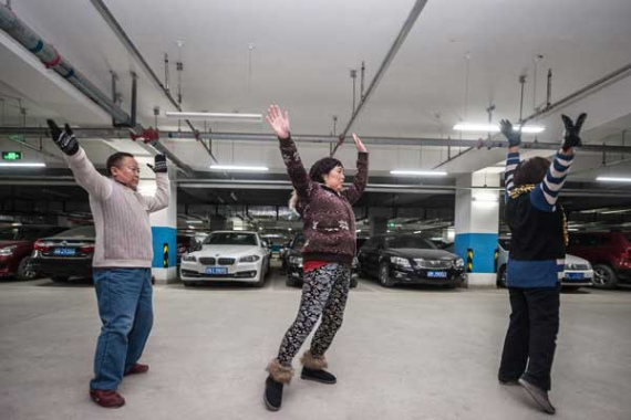 People dance in an underground garage in Beijing. (Photo: China Daily/Chen Ruishi) People dance in an underground garage in Beijing. (Photo: China Daily/Chen Ruishi)
