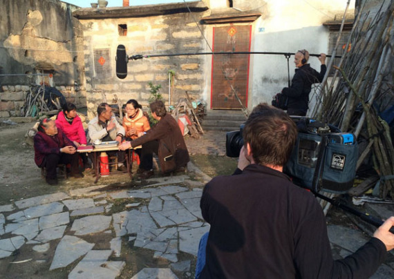 UK Historian Professor Michael Wood (sits on the right) on location for his new six-part BBC2 series 'The Story of China'. (Photo by Gerry Branigan/ Provided to China Daily)